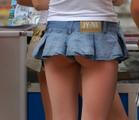 girl wearing very short mini skirt